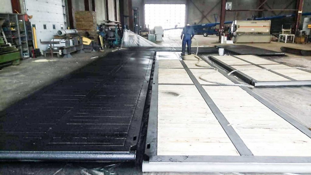 Application of Spray Coating to Walkway Sections